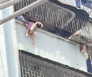 نجات دختر بچه گیر افتاده در ارتفاع توسط پلیس قهرمان + فیلم