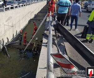 سقوط پژو ۲۰۶ داخل کانال آب ۴ متری در اتوبان باکری + تصاویر